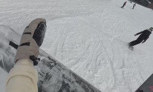 Snowboarder Learns About Not Slowing Down in the Terrain Park