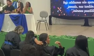 Two Playful Dogs Crash Graduation Ceremony