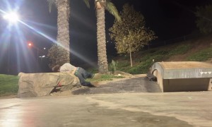 Skateboarder Falls Into a Rock