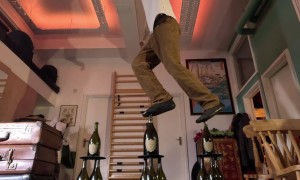 Walking On Triple Stacks Of Glass Bottles