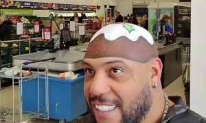 Artist Paints Christmas Pudding Illusion on Bald Head