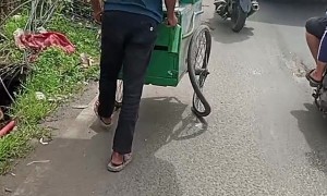 Vendor's Cart has Wildly Warped Wheel