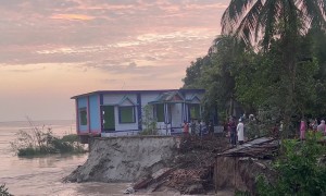 House Falls Into River in Bangladesh