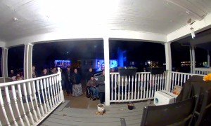 Cat Escapes When Opening the Door to Christmas Carolers