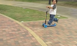 Boy on a Scooter Faceplants