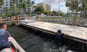 Man Struggles to Get Off Jet Ski