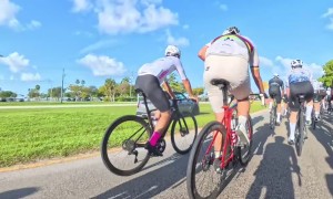 Car Veers Into Median Next to Bikers