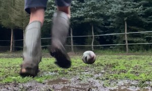 Wellies Go Flying During Muddy Football Kick