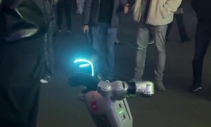 Dancing Robot Slaps Guy