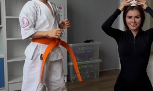 Young Karate Practitioner Kicks Mother's Head