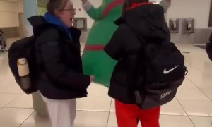 Mom Picks Up Daughter in a Christmas Tree Costume