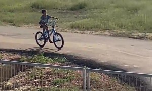 Young Bicycle Rider Crashes Into Closed Gate