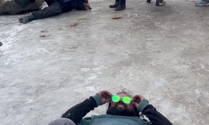 Friends Slip In Sync On Icy Path