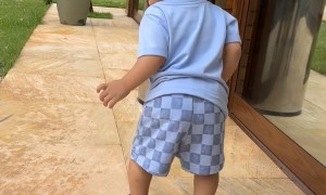 Kid Runs Into Trash Can and Falls Over