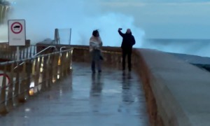 Giant Wave Drenches Adventurous Couple