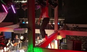Bandmate Swings From Chandelier