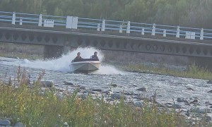 Jet Boat Meets River Bank