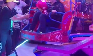 Trying to Get on Son's Amusement Park Ride Goes Wrong