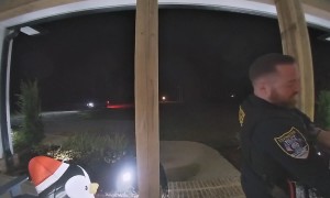 Covington Police Officer Delivers Order After Driver Gets Into Wreck
