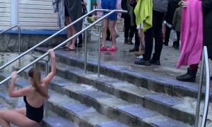 Girl Slips Down Stairs Walking Into Pool