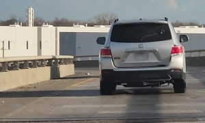 Wrecked Car Driving Off Ramp With Hood Up