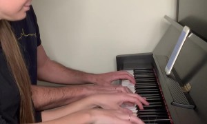 A Cat and Two Pianists