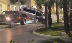Squealing Van Escapes Tow Truck