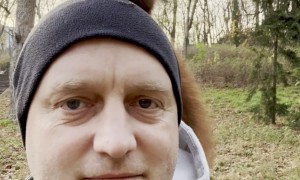 Squirrel Jumps Onto My Head to Eat a Nut