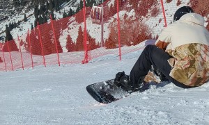 Snowboarder's Edge Catch Almost a Clear Backflip
