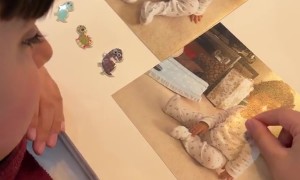 6-Year-Old Tries to Zoom in on Photo Album