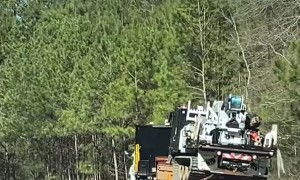 Poorly Loaded Trailer Tips Around Fast Road Curve