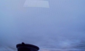 Driver Avoids Head-On Crash but Rolls Into Ditch