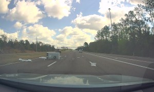 Refrigerator Falls Out of Truck on Freeway