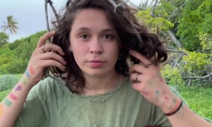 Musician Rolls With It When Hair Gets Tangled In Tree Branch