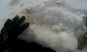 Motorcycle Breaks Through Frozen Lake and Sinks