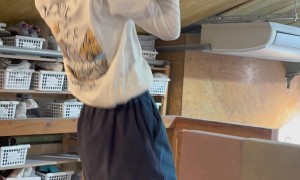 Young Climber Performs a Finger Pull-Up