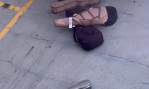 Airline Employee Caught Throwing Guitar Cases On Ground