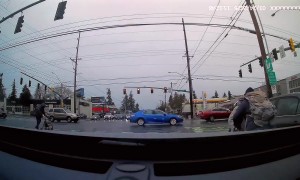 Elderly Woman Nearly Hits Pedestrians In Crosswalk, Then Reverses Into Them