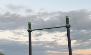 Man Falls Off Pull-Up Bar Onto Metal Railing