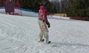Snowboarder Lands on His Back