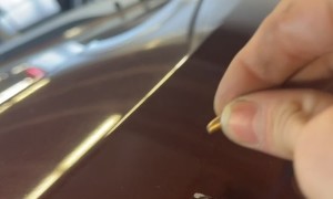 Mechanic Finds Bullet on Car Body