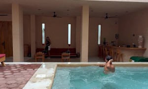 Guy Jumps From Balcony Into Pool