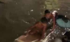 Children Play In Flooded Street