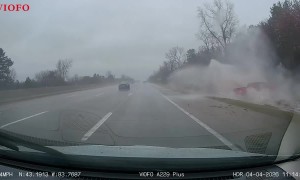 Red Pickup Hydroplanes Into Ditch
