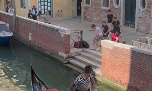 Gondolier Saves Football From Canal With Backheel