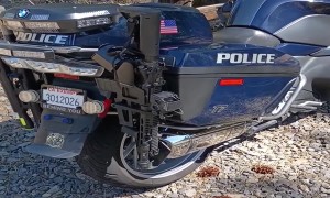 Wreckless Bike Cop Leaves Rifle Out