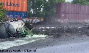 Train Collides With Septic Truck
