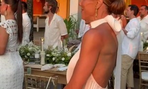 Woman Discreetly Puts Out Fire at Wedding