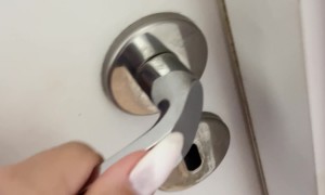 Woman Opens Door To See Dog Wielding Knife
