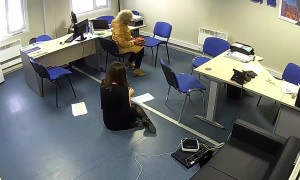 Woman's Feet Tangle In Computer Wires